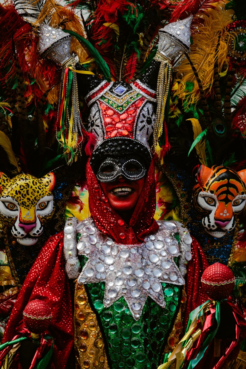 Person in elaborate costume with animal masks