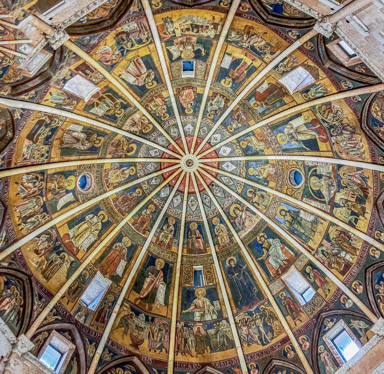 Intricate frescoes decorate the dome of the Parma Cathedral, Italy.